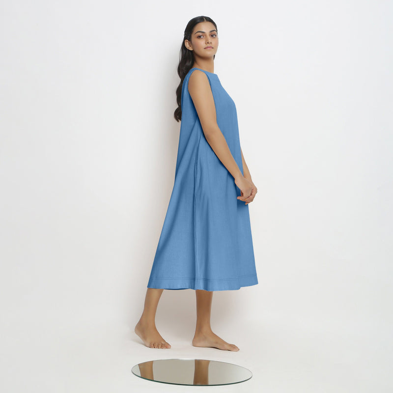 Right View of a Model wearing Powder Blue Vegetable Dyed A-Line Paneled Dress