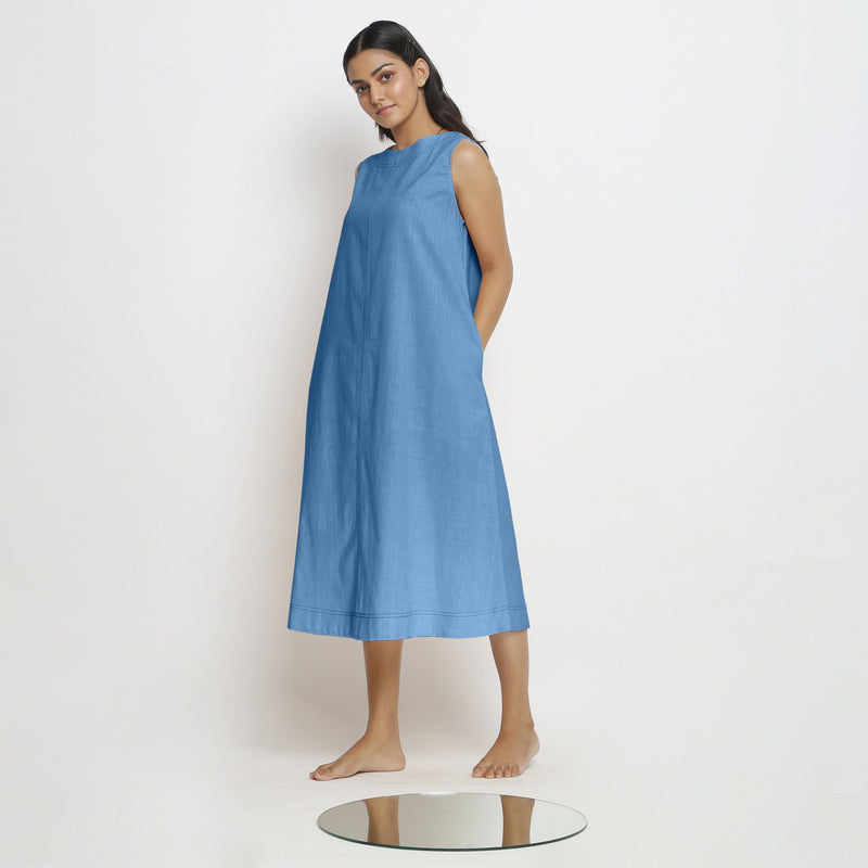 Left View of a Model wearing Powder Blue Vegetable Dyed A-Line Paneled Dress