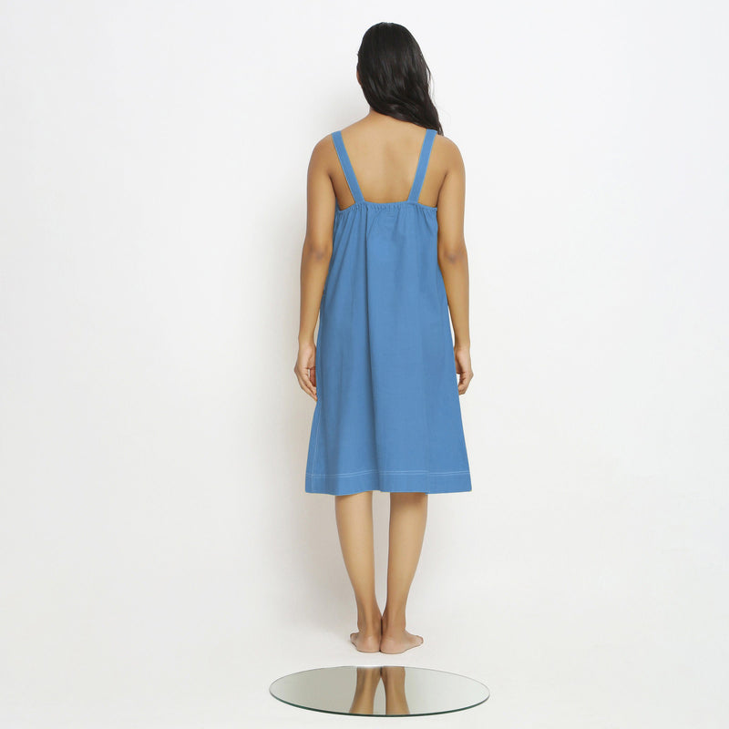 Back View of a Model wearing Powder Blue Vegetable Dyed Handspun Slip Dress