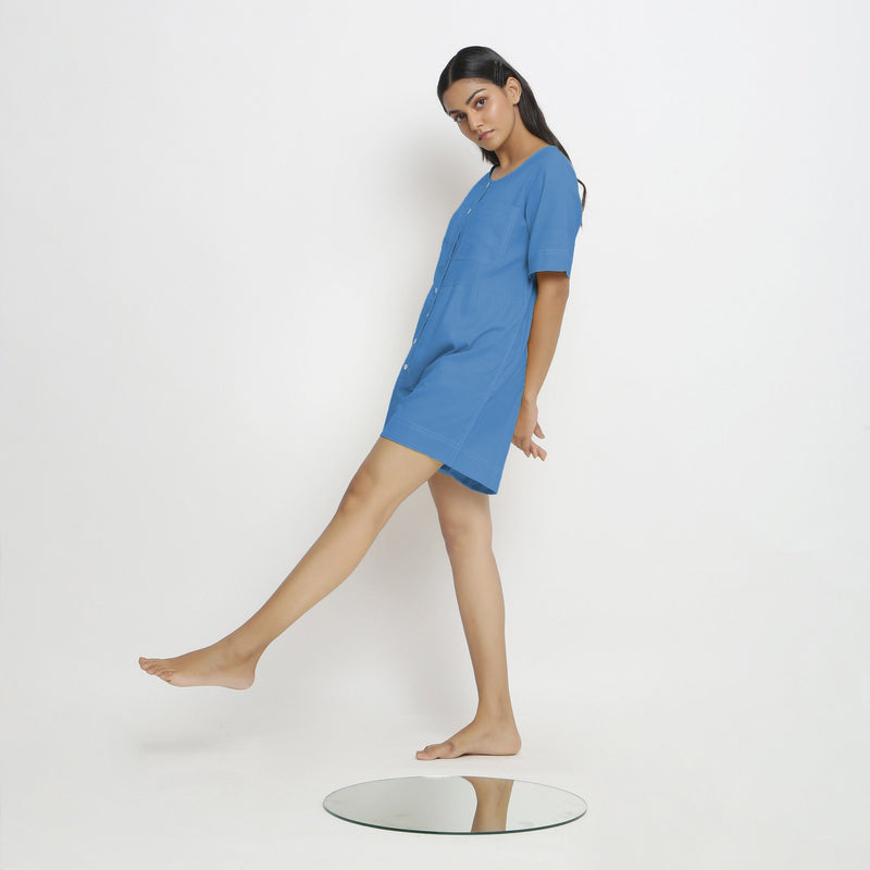 Left View of a Model wearing Powder Blue Vegetable Dyed Romper