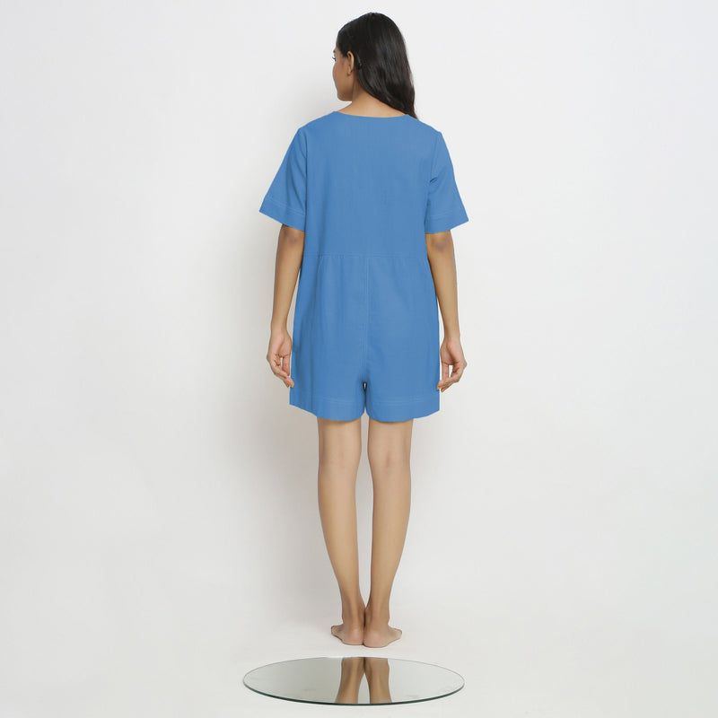 Back View of a Model wearing Powder Blue Vegetable Dyed Romper