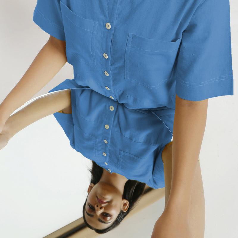 Front Detail of a Model wearing Powder Blue Vegetable Dyed Romper