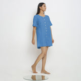 Right View of a Model wearing Powder Blue Vegetable Dyed Romper