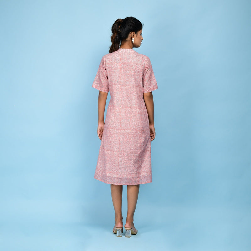 Back View of a Model wearing Powder Pink Cotton Block Print Knee-Length Kaftan Dress