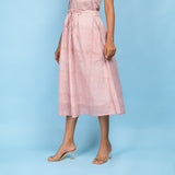 Left View of a Model wearing Powder Pink Paisley Block Printed Cotton Midi Skirt