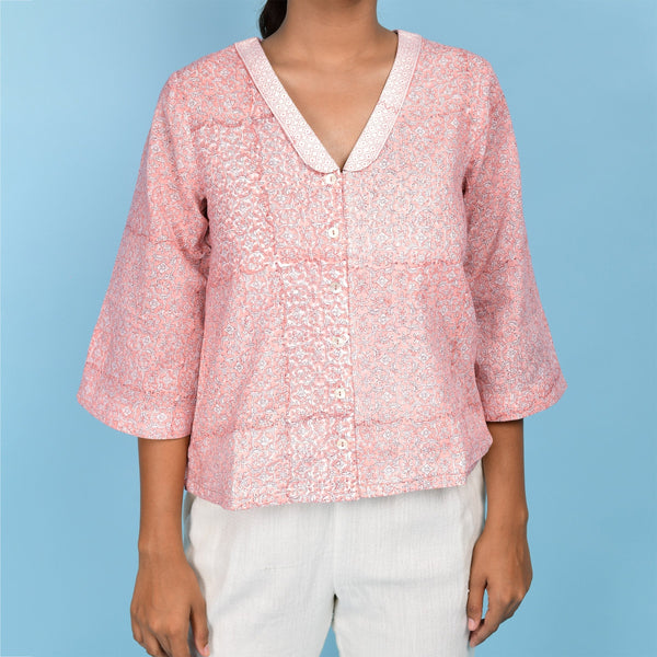 Front Detail of a Model wearing Powder Pink Block Printed Chelsea Collar Cotton Top