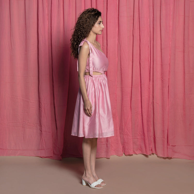 Right View of a Model wearing Powder Pink Cotton Chanderi Knee Length One Shoulder Dress