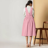 Back View of a Model wearing Powder Pink Cotton Flax Pinafore Midi Wrap Dress
