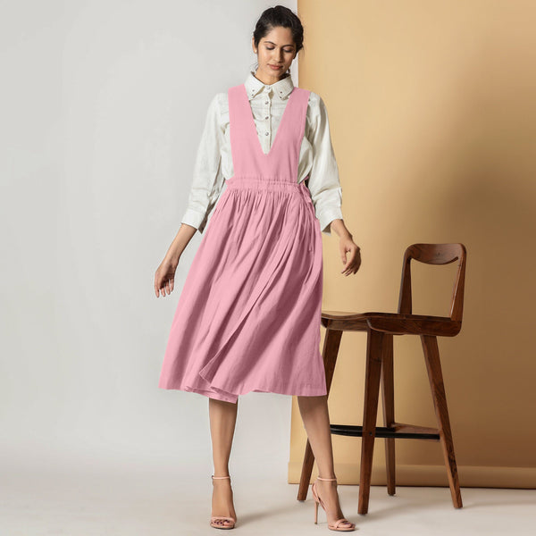 Front View of a Model wearing Powder Pink Cotton Flax Pinafore Midi Wrap Dress