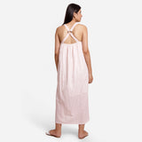 Back View of a Model wearing Powder Pink Cotton Block Print Gathered Maxi Dress