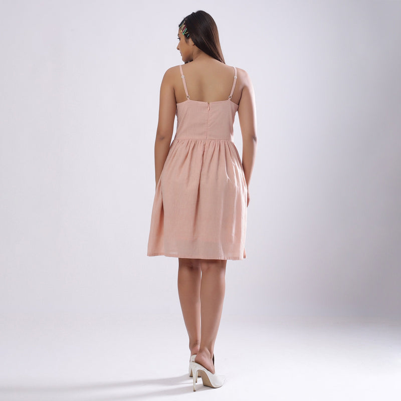 Back View of a Model wearing Powder Pink Handspun Camisole Dress