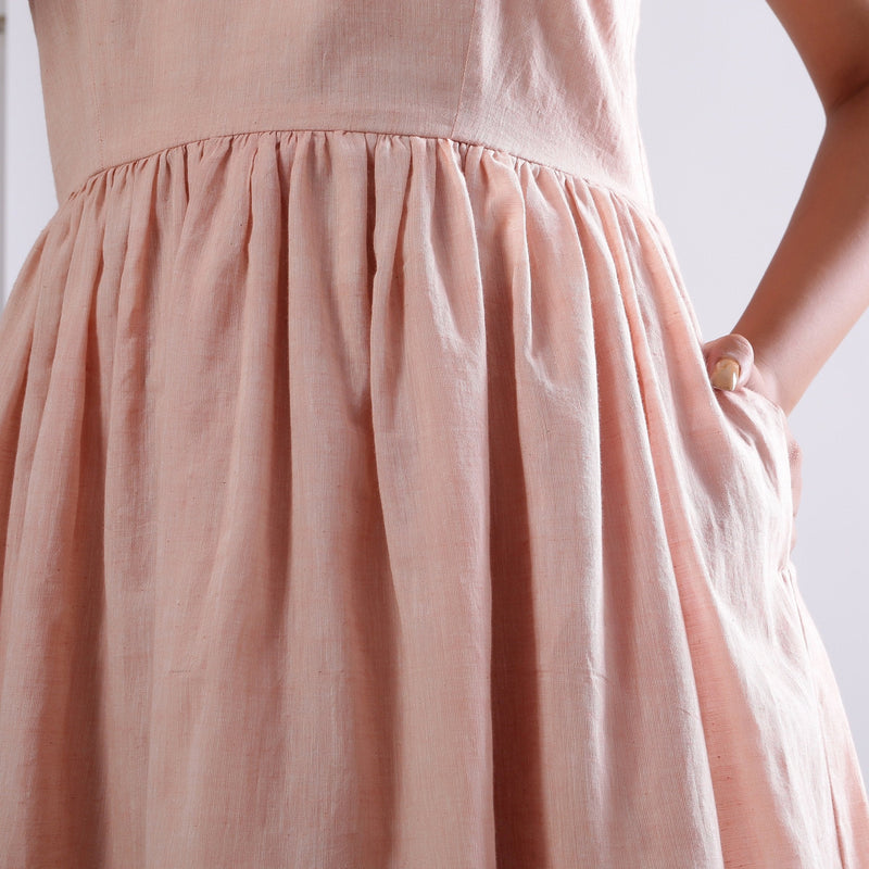 Front Detail of a Model wearing Powder Pink Handspun Camisole Dress