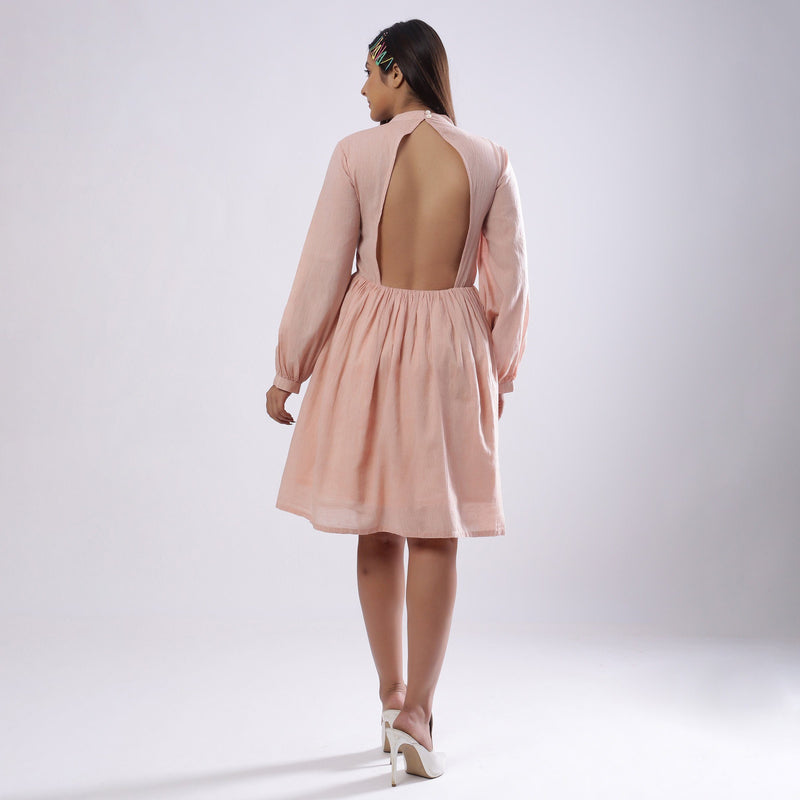 Back View of a Model wearing Powder Pink Backless Gathered Dress