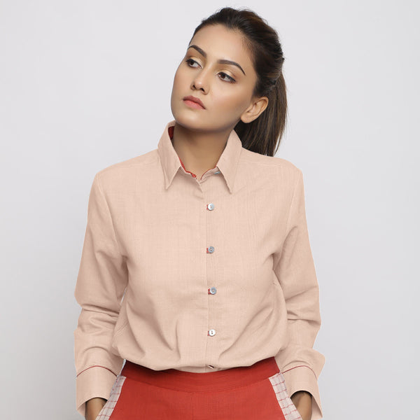 Front View of a Model wearing Powder Pink Vegetable Dyed 100% Cotton Button-Down Shirt