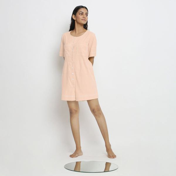 Front View of a Model wearing Powder Pink Vegetable Dyed Romper