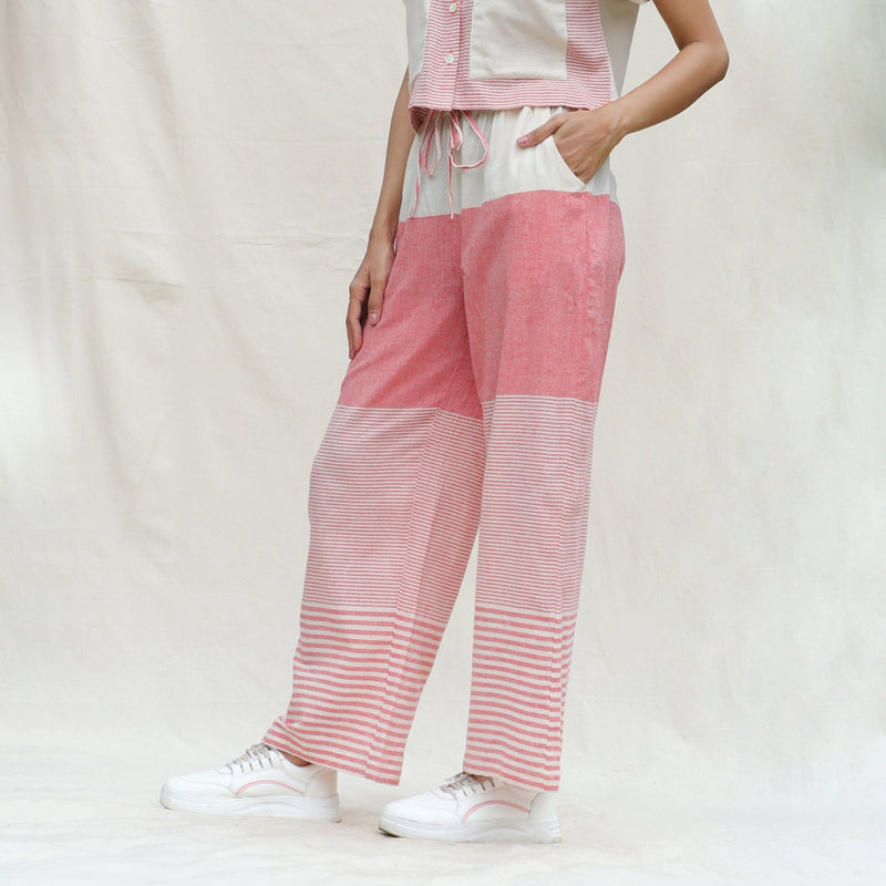 Left View of a Model wearing Red and Beige Striped 100% Cotton Mid-Rise Elasticated Straight Pant