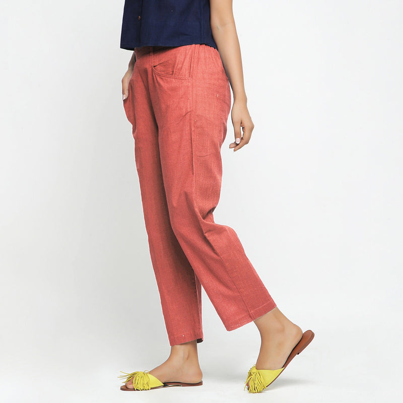 Left View of a Model wearing Red Ankle Length Mid-Rise Chinos
