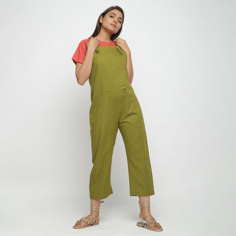 Front View of a Model wearing Red Boat Neck Top and Olive Green Dungaree Set