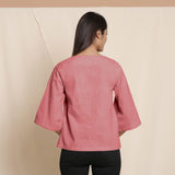 Back View of a Model wearing Red Comfy Straight Top