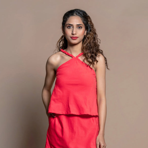Front View of a Model wearing Red 100% Cotton Velvet Halter Neck Flared Top