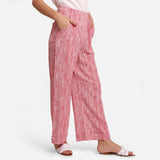 Right View of a Model wearing Red Crinkled Cotton Ankle Length Pant