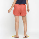 Back View of a Model wearing Red Solid Cotton Short Shorts