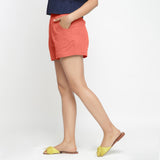 Left View of a Model wearing Red Solid Cotton Short Shorts