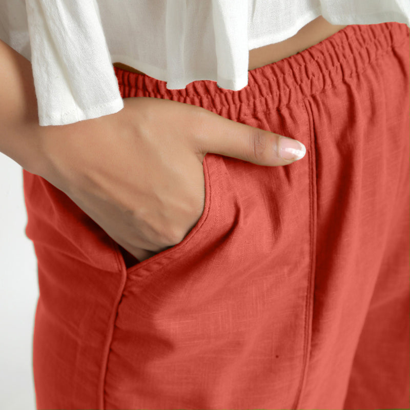 Right Detail of a Model wearing Red Wide Legged Straight Pant