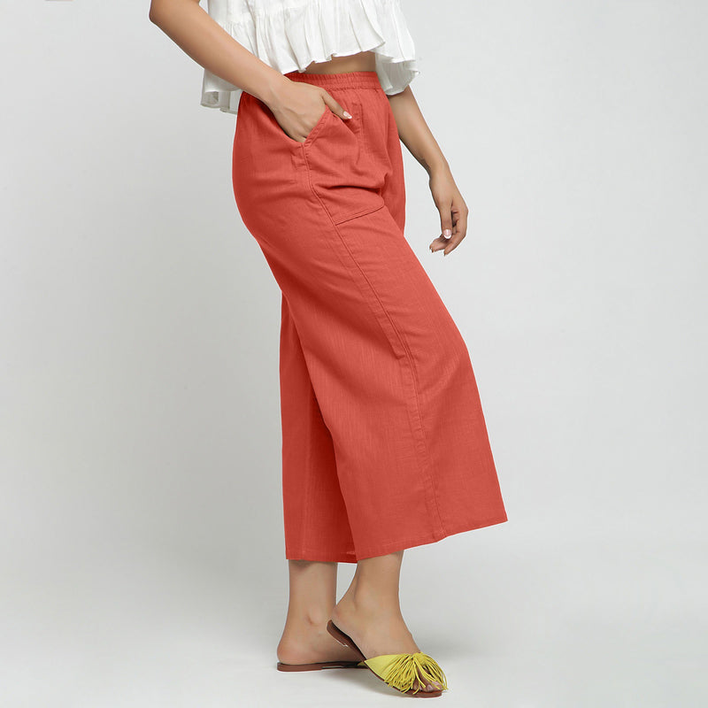 Right View of a Model wearing Red Wide Legged Straight Pant