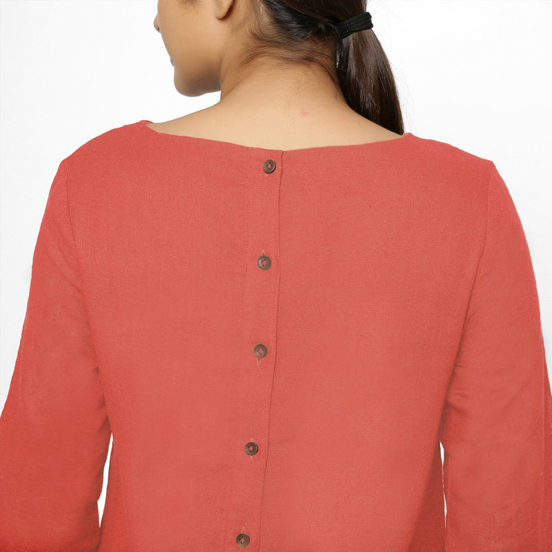Back Detail of a Model wearing Red Yoked Cotton Tunic Dress
