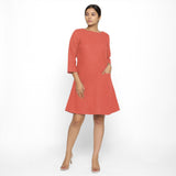 Front View of a Model wearing Red Yoked Cotton Tunic Dress