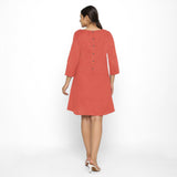 Back View of a Model wearing Red Yoked Cotton Tunic Dress