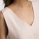 Front Detail of a Model wearing Vegetable Dyed Pink Deep Neck Top