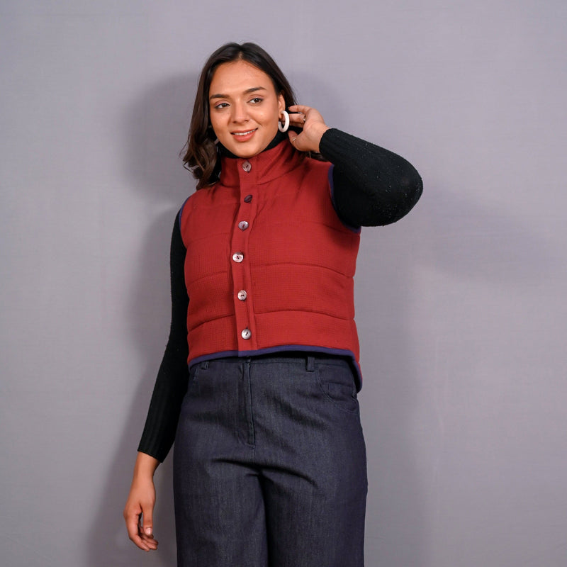 Front View of a Model wearing Reversible Blue and Red Warm Cotton Waffle Sleeveless Quilted Puffer Jacket