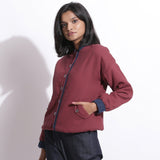 Left View of a Model wearing Reversible Blue Red Warm Cotton Waffle Bomber Jacket