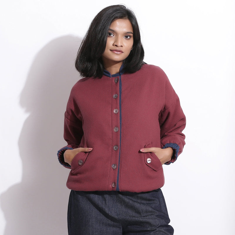 Front View of a Model wearing Reversible Blue Red Warm Cotton Waffle Bomber Jacket