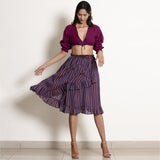 Front View of a Model wearing Reversible Crop Top and Wrap Skirt Set