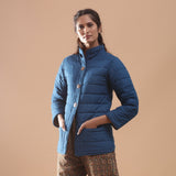 Left View of a Model wearing Blue Reversible Detachable Quilted Cotton Hoodie Jacket