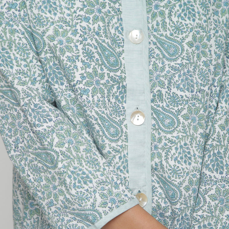 Front Detail of a Model wearing Reversible Green Button-Down Outerwear