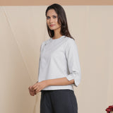Left View of a Model wearing Reversible Grey Warm Cotton Button-Down Short Top