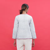 Back View of a Model wearing Reversible Printed Quilted Cotton Jacket