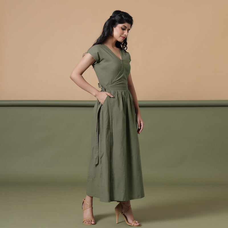 Right View of a Model wearing Reversible Shibori Green Wrap Dress