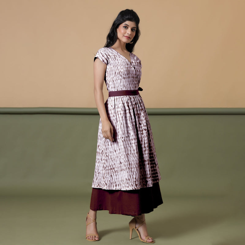 Right View of a Model wearing Reversible Maroon Tie-Dye Cotton V-Neck Maxi Wrap Dress
