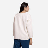 Back View of a Model wearing Reversible White Warm Cotton Corduroy Short Jacket