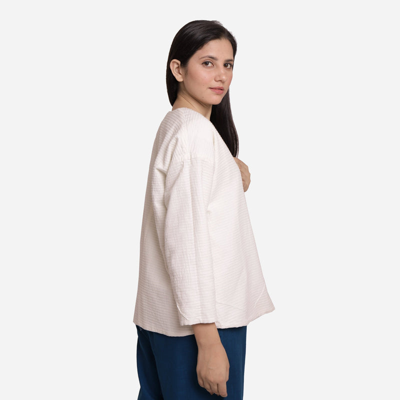 Right View of a Model wearing Reversible White Warm Cotton Corduroy Short Jacket