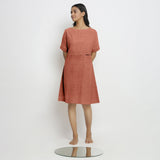 Front View of a Model wearing Rust 100% Linen Yoked Knee Length Shift Dress