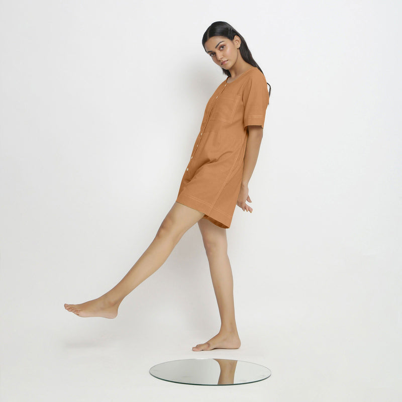 Left View of a Model wearing Rust Vegetable Dyed Romper