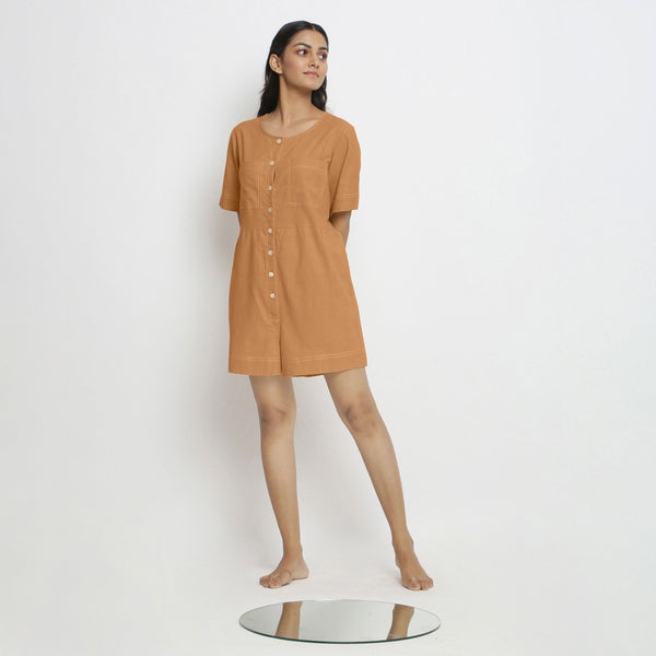 Front View of a Model wearing Rust Vegetable Dyed Romper
