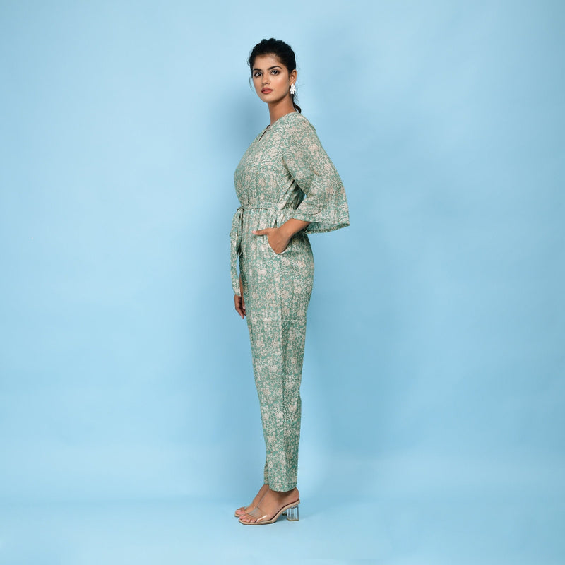 Left View of a Model wearing Sage Green Block Printed Ankle Length Cotton Jumpsuit
