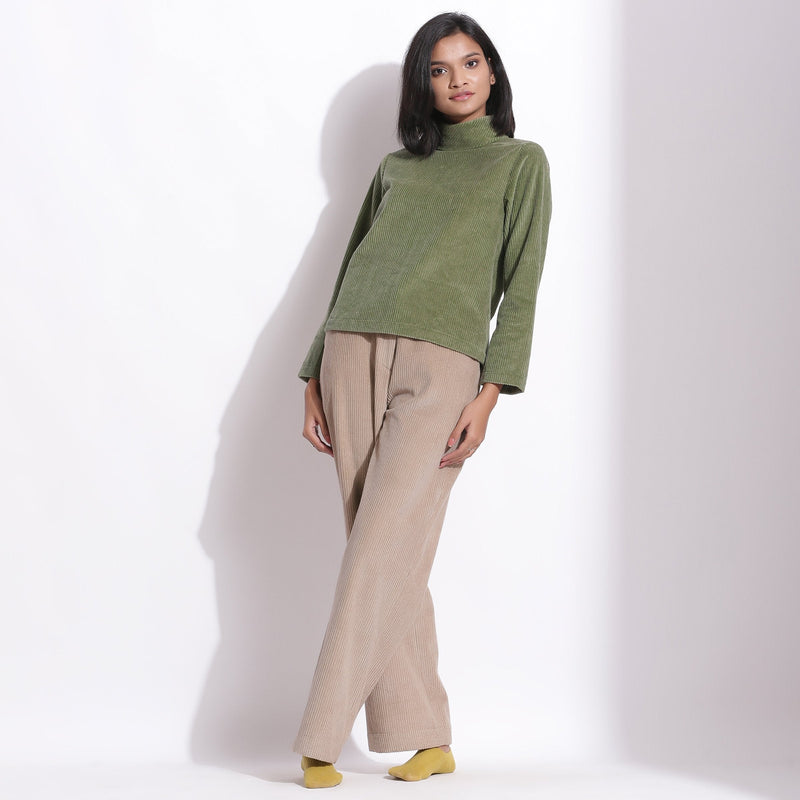 Front View of a Model wearing Sage Green Warm Cotton Corduroy High Neck Top